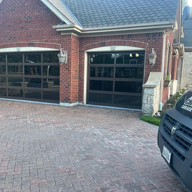 Instagram post: 🚪 Exciting News! 🚪 Chicago Garage Door is thrilled to announce the arrival of the stunning C.H.I. Full View Door with Insulated Tinted ...